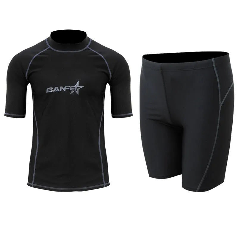 Men's quick-drying half sleeve swim suit with separate swim top and pants in navy blue.