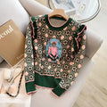Green printed women's loose fit sweater on a hanger, free size.