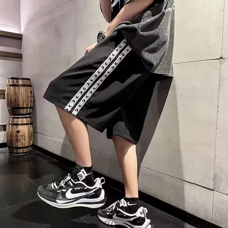 Men's casual baggy track pants in micro-elastic polyester available in sizes M to 5XL