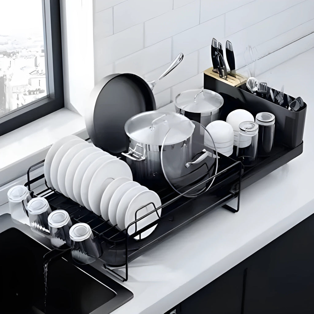 Foldable carbon steel kitchen dish rack holding cutlery, knives, forks and cups.