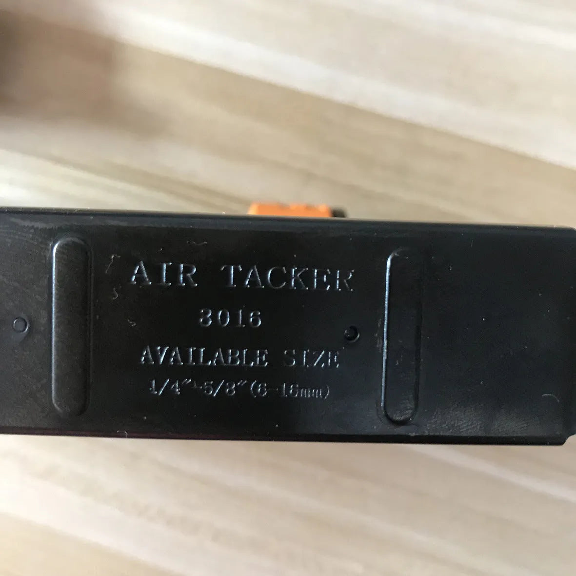 Blue pneumatic strip nail gun with American connector for decoration and upholstery work