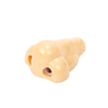 Flesh coloured plastic pencil sharpener with big nostril hole showing compact geometry shape