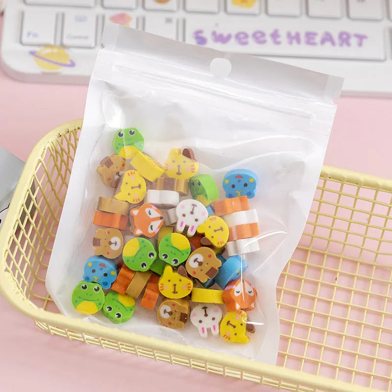 50 colourful cartoon mini erasers in pearlescent bags showing fruit, animal, and holiday designs
