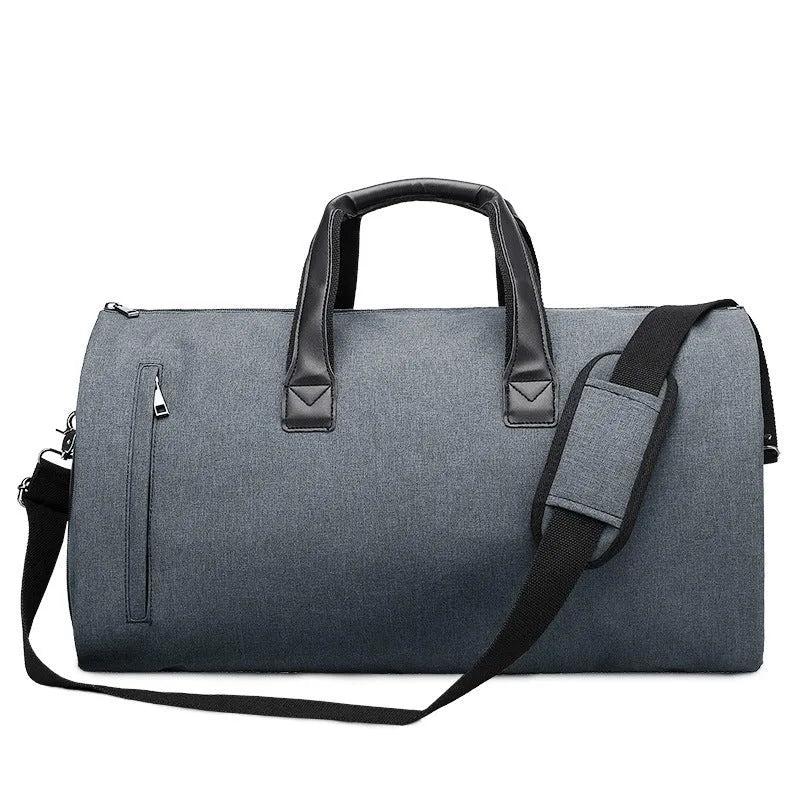 Light grey oval travel bag with multiple internal compartments for organisation.