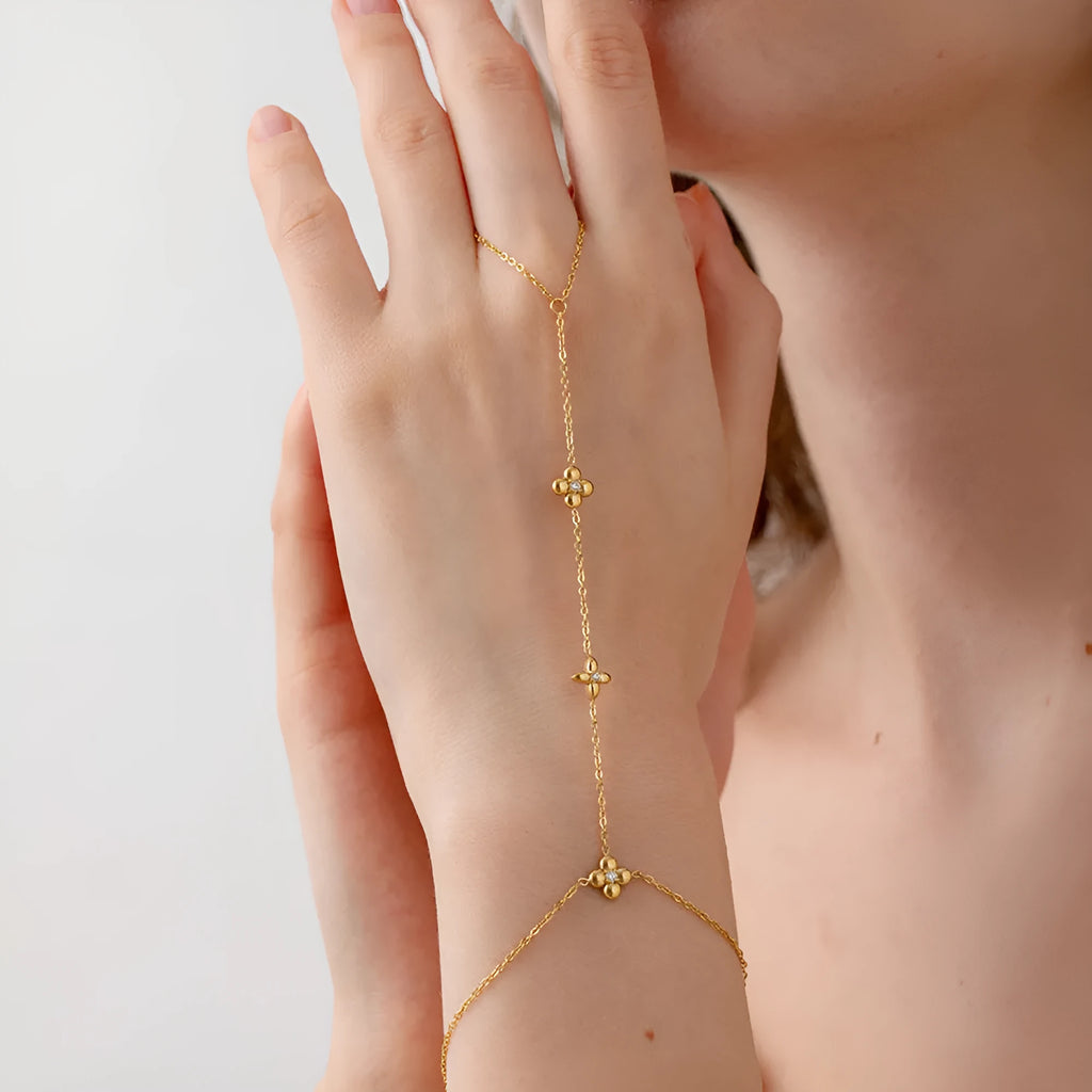 Gold stainless steel bracelet with geometric flower and octagonal star design