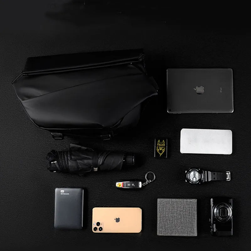 Grey medium square crossbody bag for men showing internal phone and document compartments