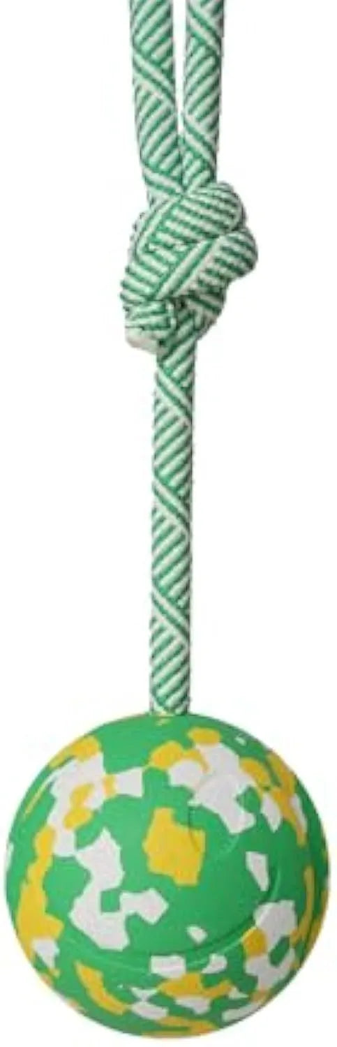 Natural rubber dog ball with nylon rope attached, suitable for fetch and tug games with medium small dogs