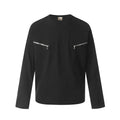 Man wearing a loose fit grey long sleeve cotton t-shirt for casual wear.