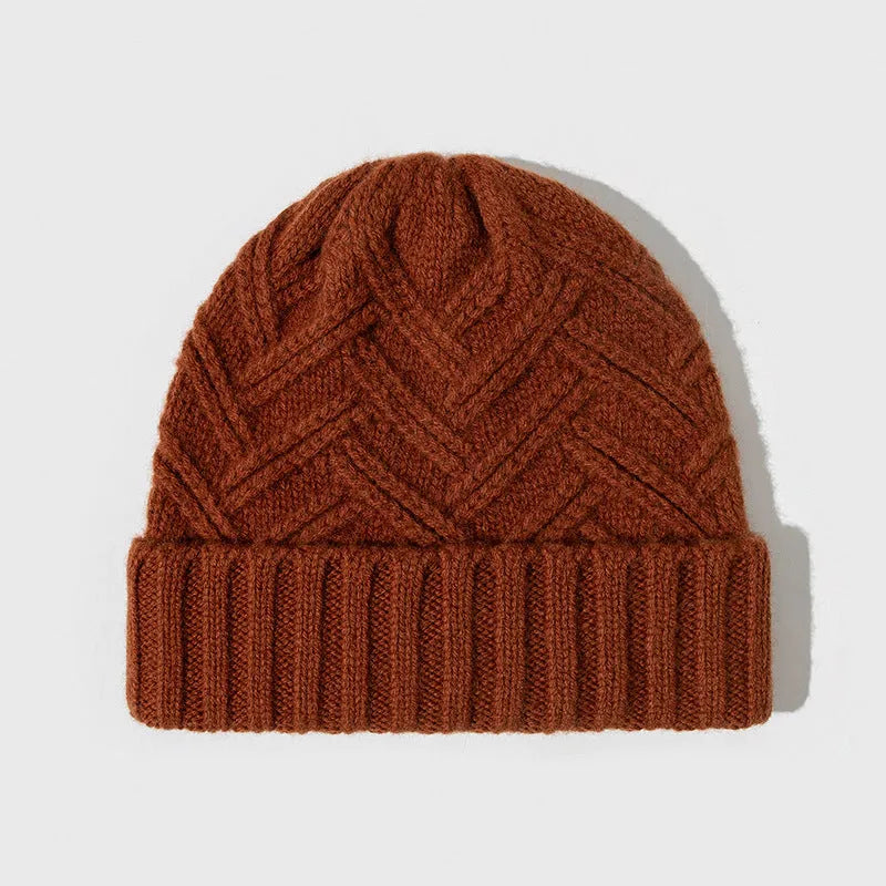 Women's wool knitted dome winter hat with a textured totem pattern.
