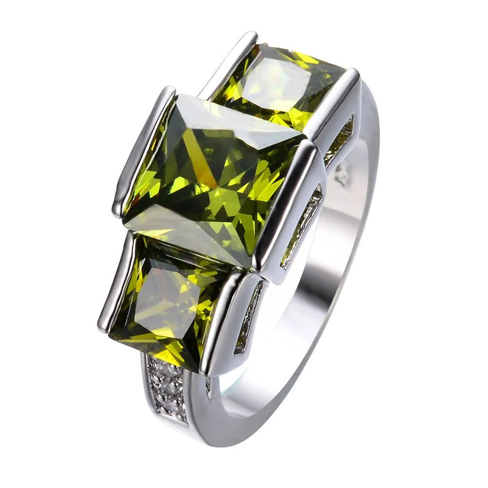 Women's geometric rainbow metal ring in electroplated copper showing colour options.