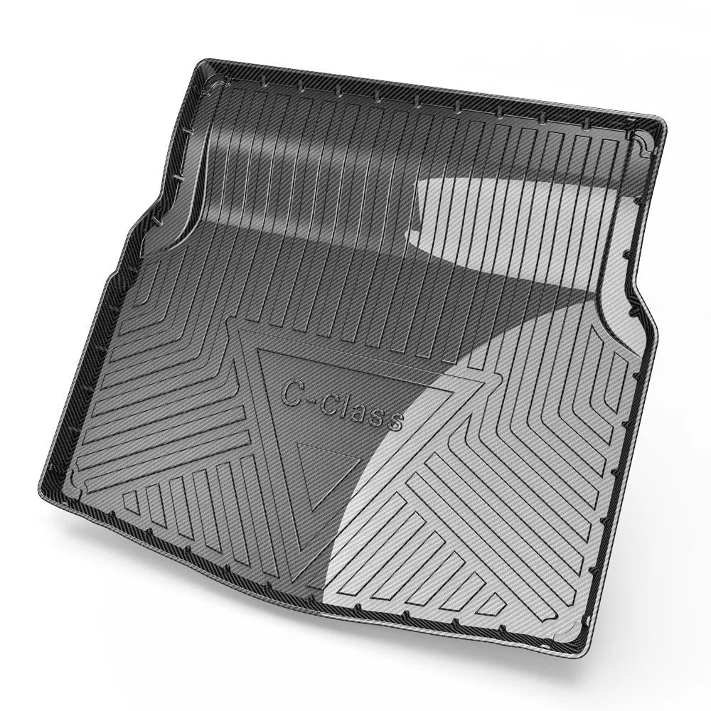 Black TPE car boot liner with carbon fibre pattern texture.
