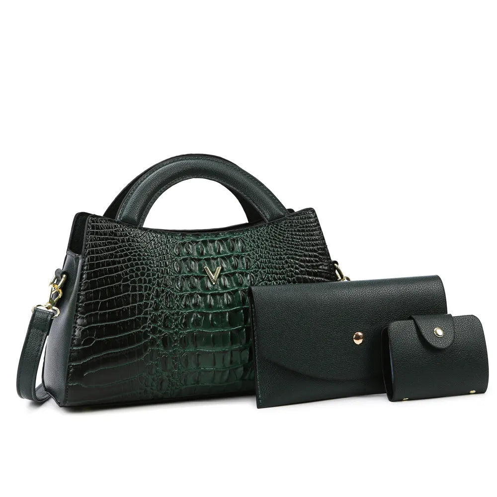 Women's black crocodile pattern PU leather crossbody bag showing internal phone and document pockets.