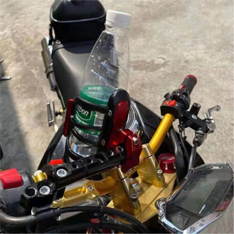 Modified water bottle cage mounted on Honda X-ADV scooter bumper in multiple colour options