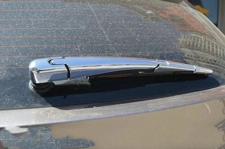 Set of four silvery ABS plastic rear wiper cover trims for a 2010 Hyundai.
