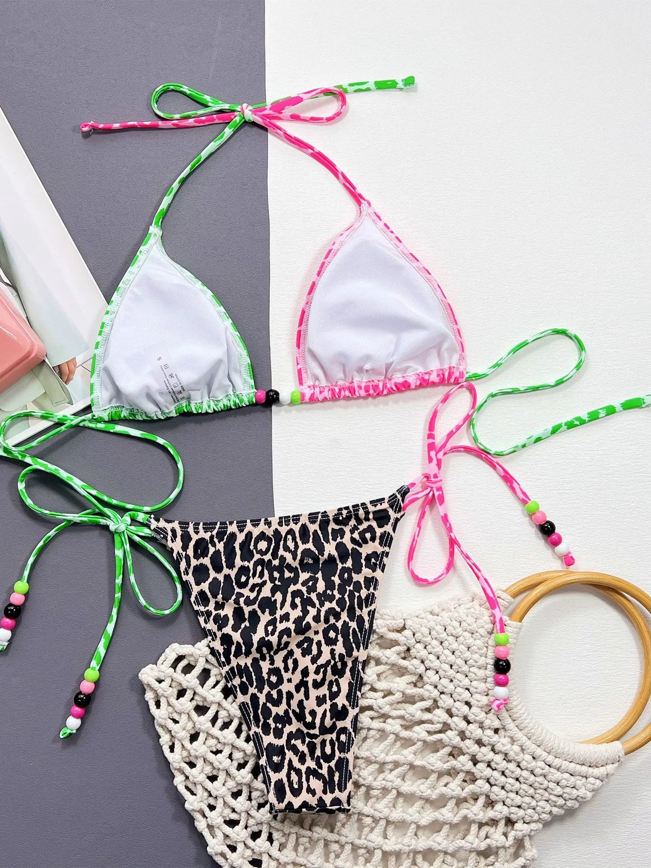 Leopard print women's bikini swimsuit with briefs style and lining.