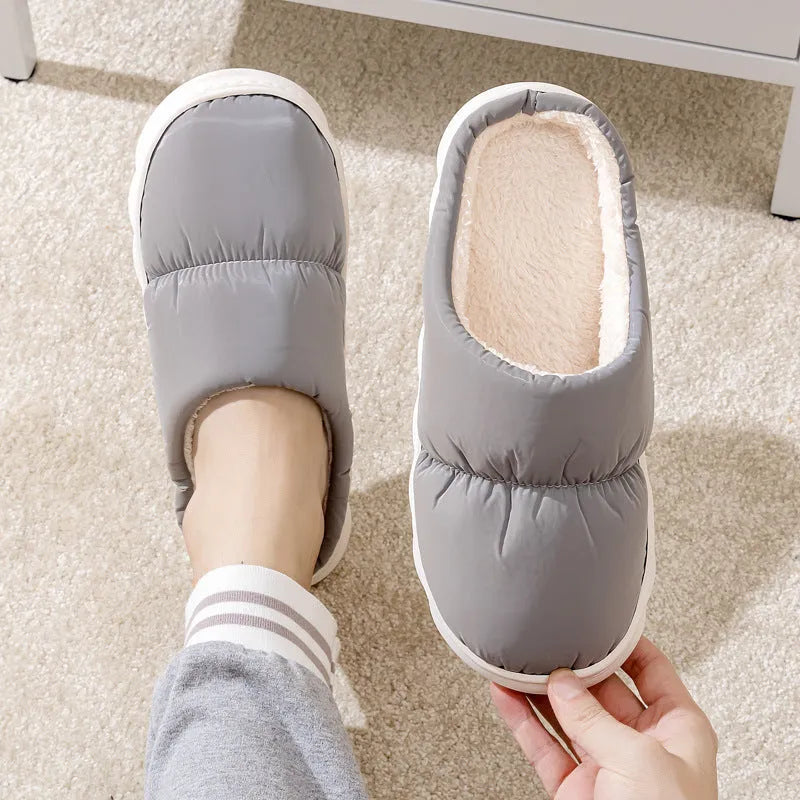 Blue plush indoor slippers with thick rubber sole and artificial fur lining