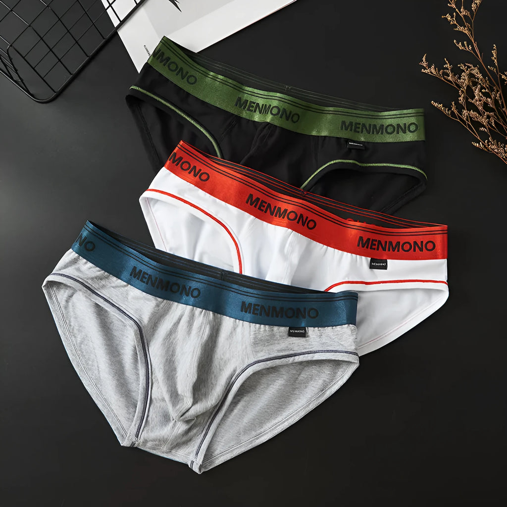 Men's low waist cotton briefs showing solid colour block design in various two-tone combinations.