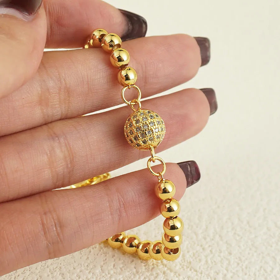 Copper bracelet with zircon stones in heart-shaped Arabic design for women