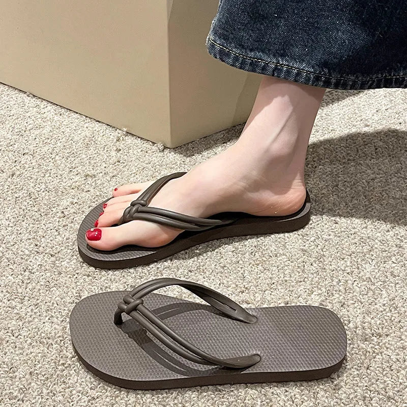 Men's PVC flip flops in a covered toe style on a light background, showing colour options.