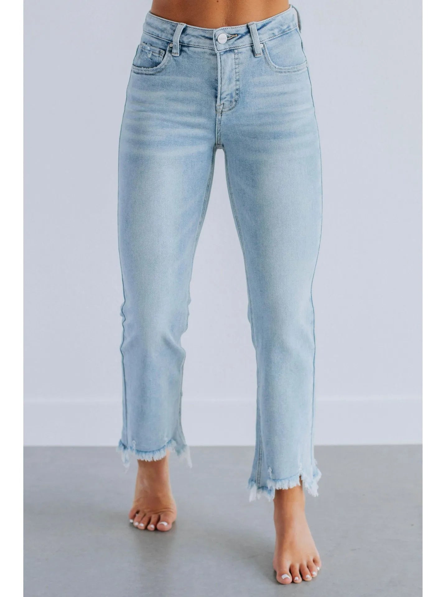 Women's dark blue cotton denim jeans with hand-distressed detailing and casual styling