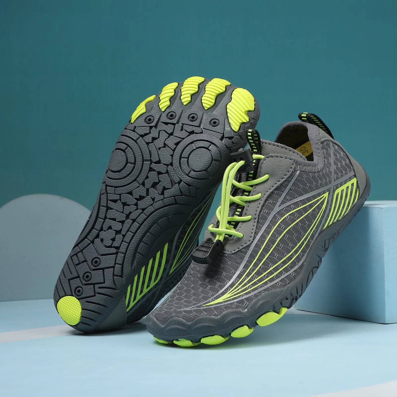 Children's elasticated water shoes in blue with a non-slip rubber sole and breathable mesh upper.