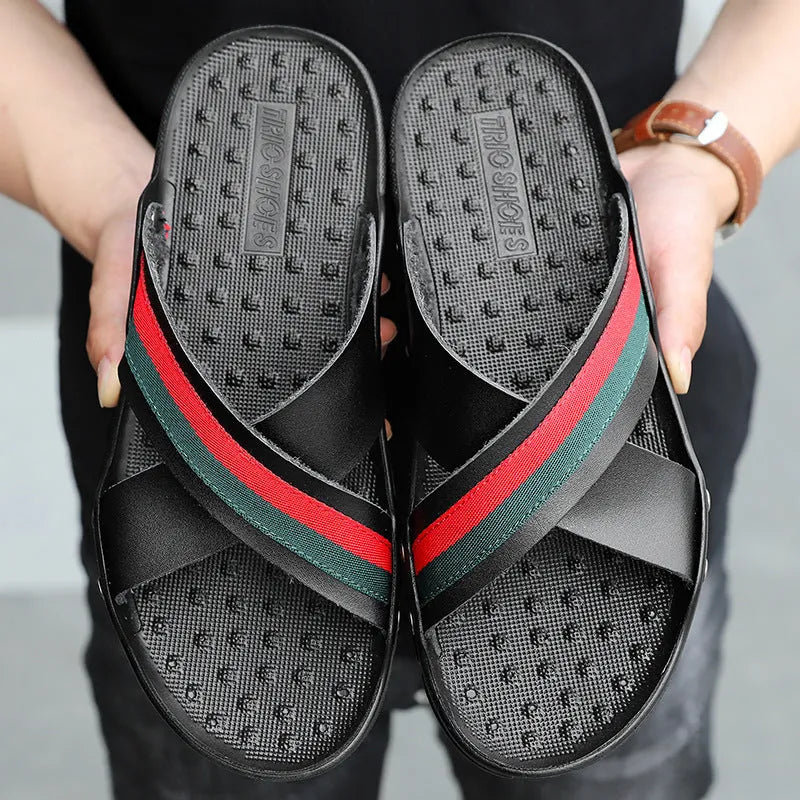 Men's cowhide leather flip-flops in white, blue, and black on a PU sole.