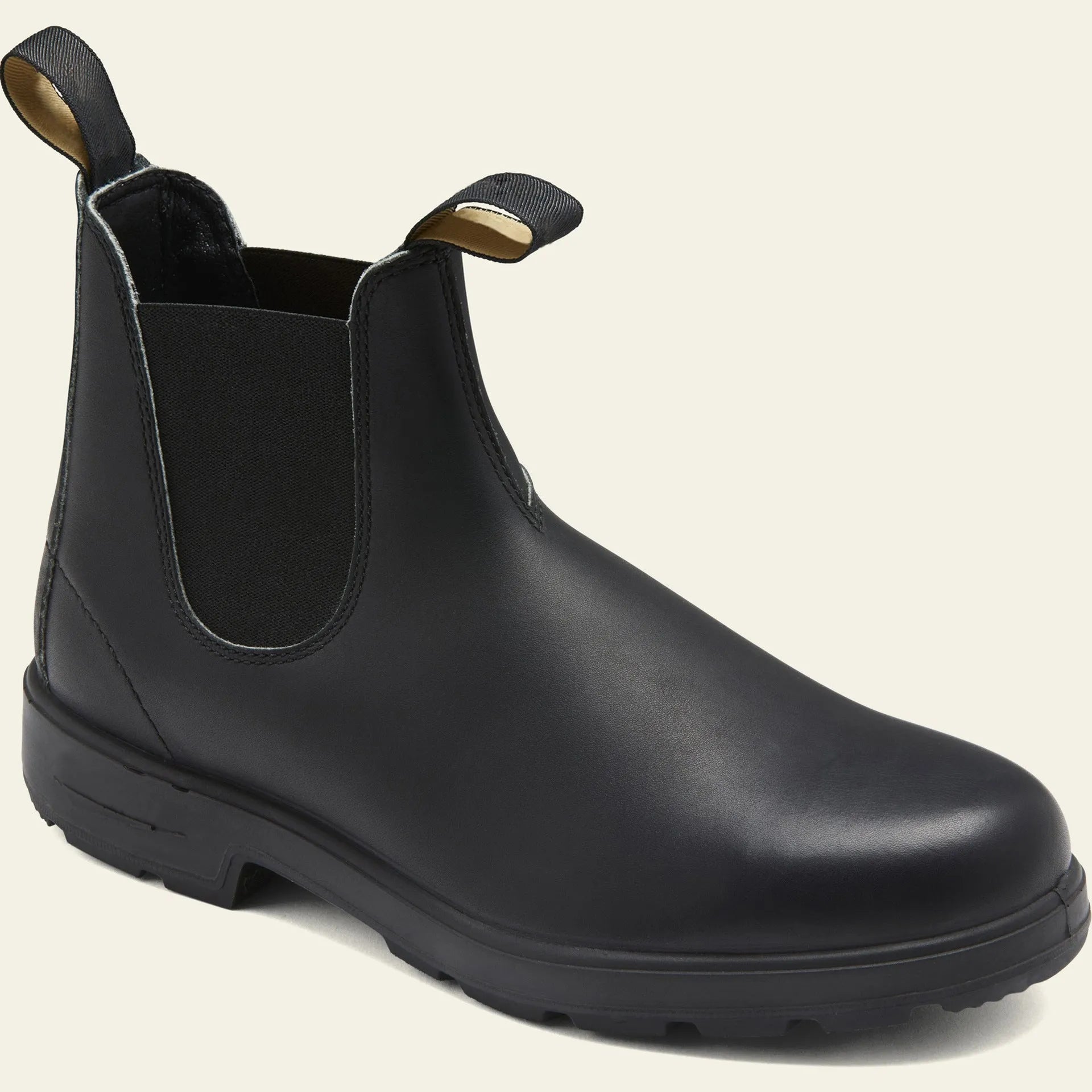 Vintage frosted brown Chelsea boot with round toe and mid-calf height on a neutral background.