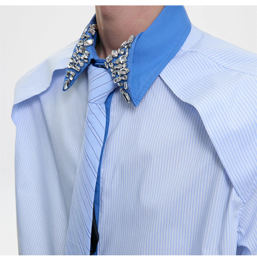 Men's blue loose fit diamond tie patchwork striped shirt with flip collar and button decorations.