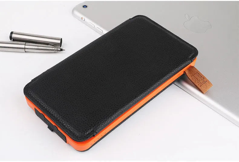Outdoor solar phone charger in multiple colours showing solar panel, LED light, and leather finish.