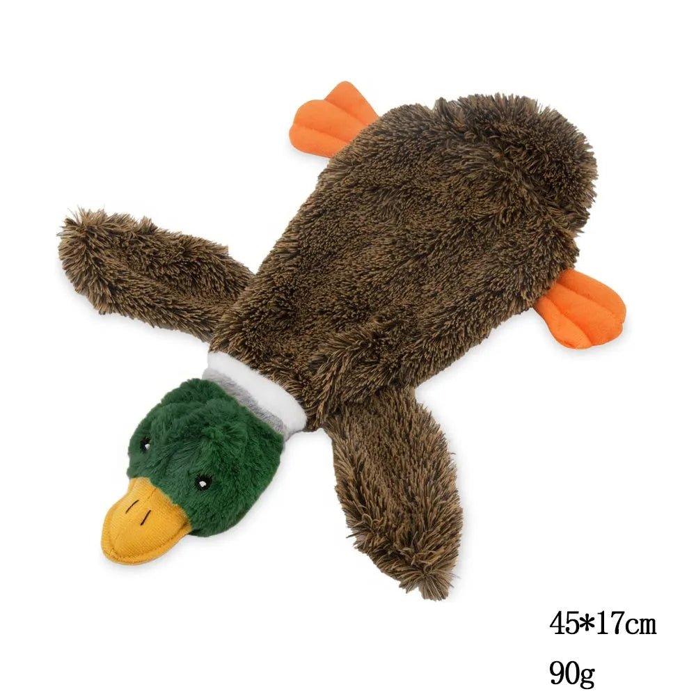 Green stuffless dog toy shaped like a wild duck with two squeakers and bottle cavity opening