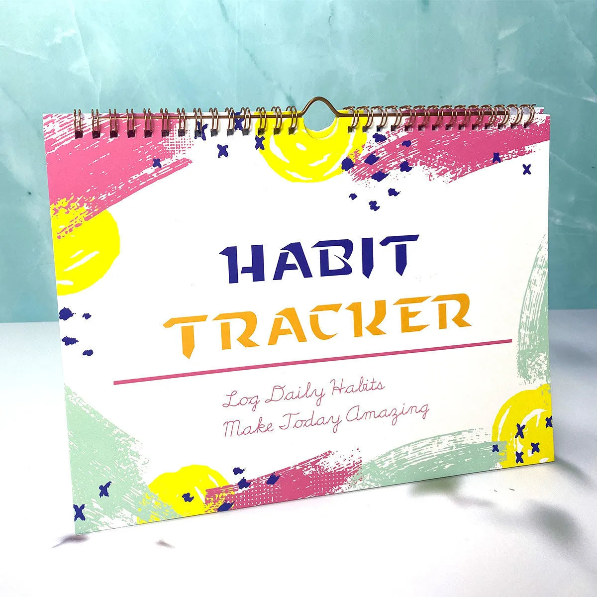 English habit tracking device showing 21cm by 28cm size with 12 internal pages for self-discipline planning