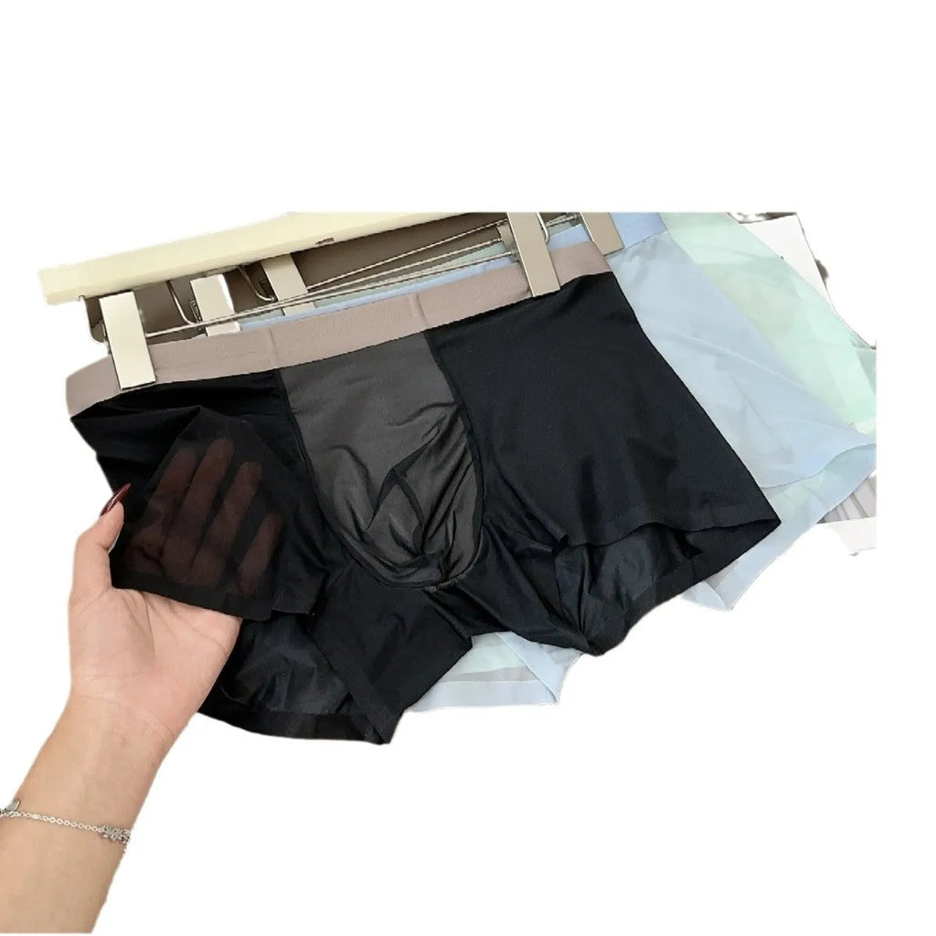 Ultra-thin Ice Silk men's seamless boxer shorts with a honeycomb crotch panel in a solid colour.
