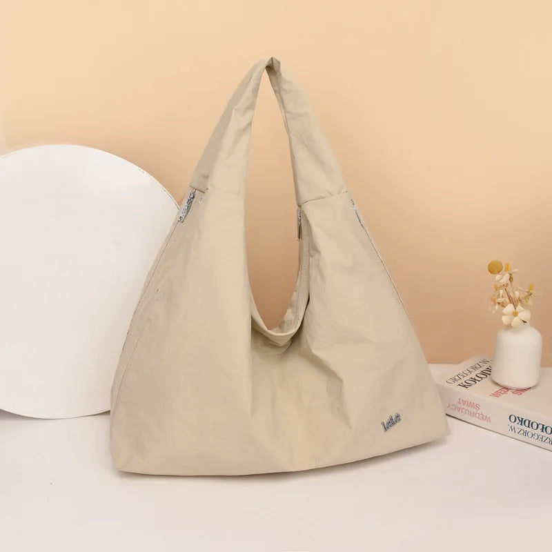 Women's heart-shaped nylon crossbody bag in black, yellow, khaki or blue colours