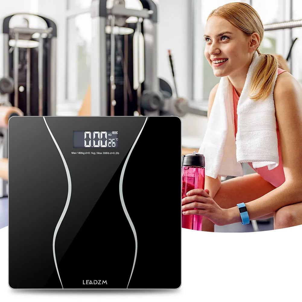 Black electronic digital bathroom scale with 180kg capacity for weight measurement