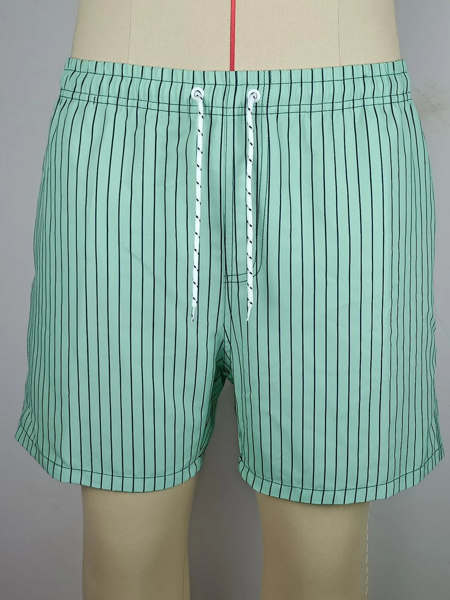 Striped casual shorts in light blue, shown front-on, with straight leg opening.