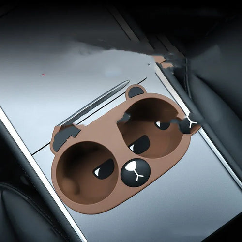 Grey silicone car cup holder insert with cartoon print for anti-shake bottle stabilisation