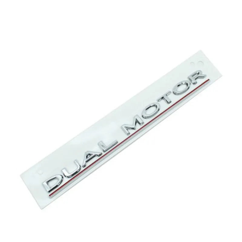 Tesla Model 3 black and red ABS plastic bumper sticker measuring 19cm by 3cm.