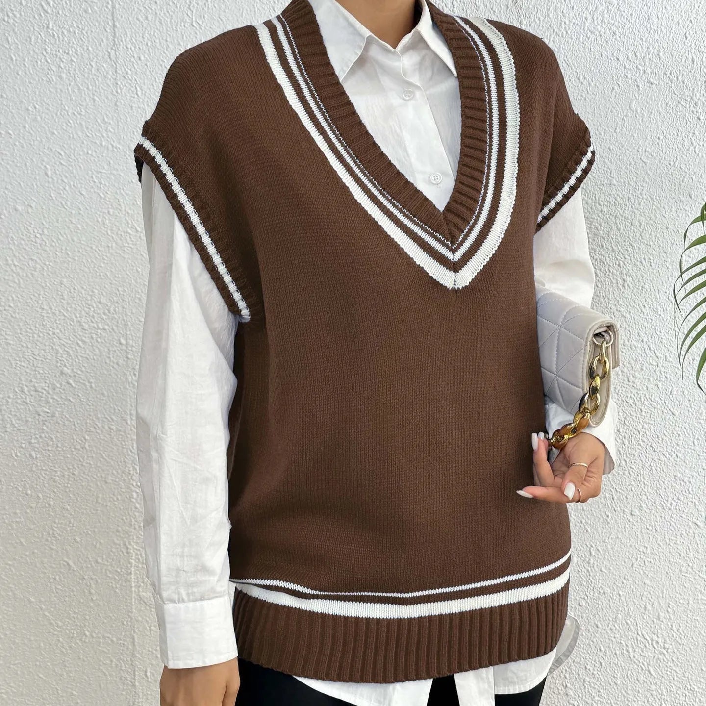 Women's loose fit college style vest sweater in acrylic polyester blend, black blue coffee colour options