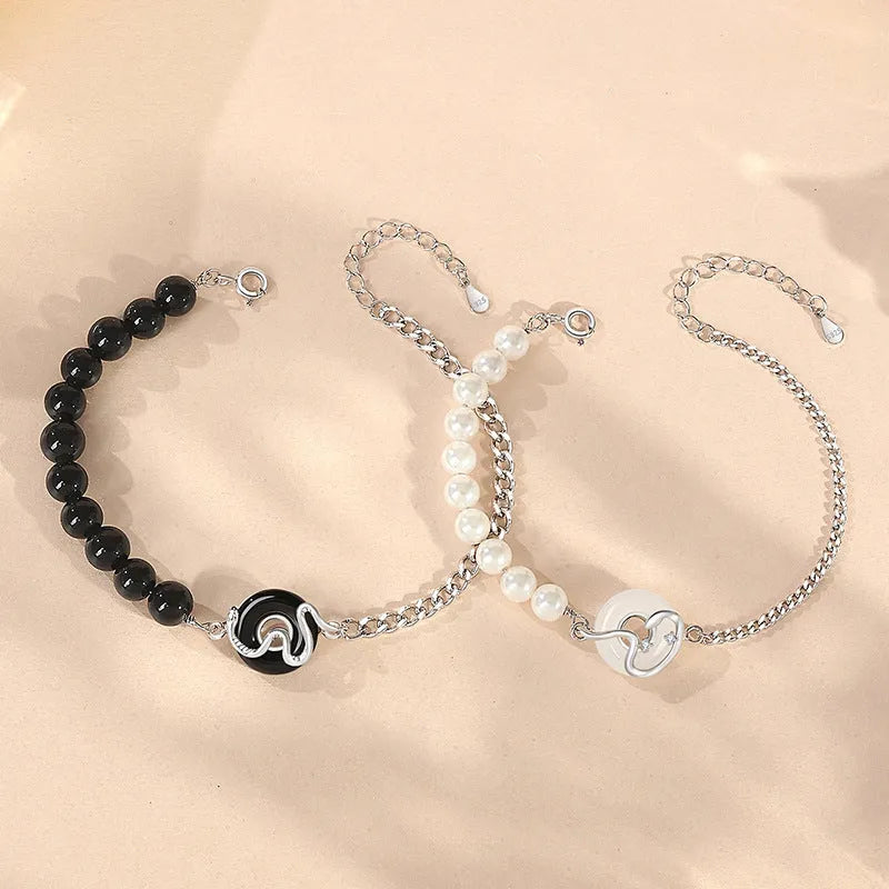 New Chinese style snake zodiac bracelet in 925 sterling silver with a peace buckle clasp, shown in male and female variants.