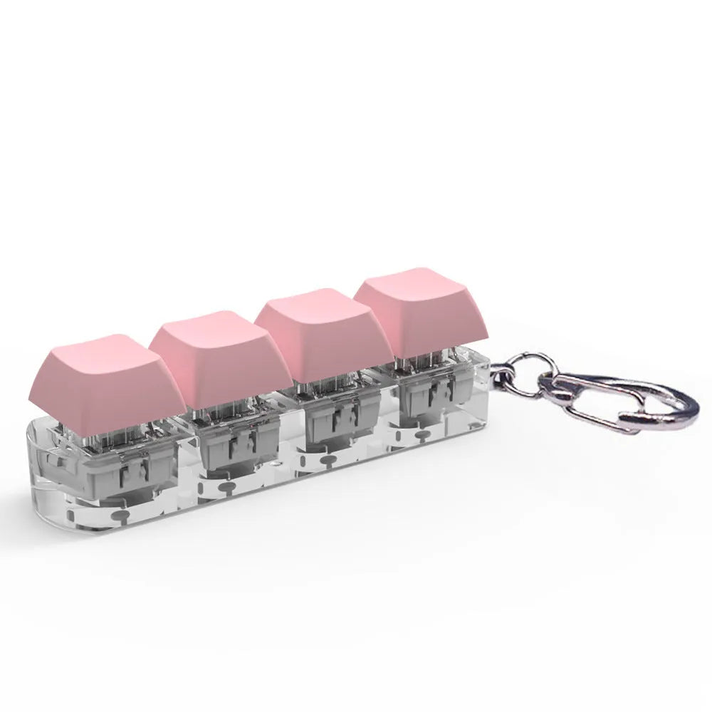 4-key mechanical keyboard switch tester with transparent bottom shell on desk