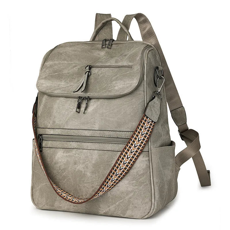 Retro college backpack in PU material with a curved shoulder strap shown in multiple colour options.