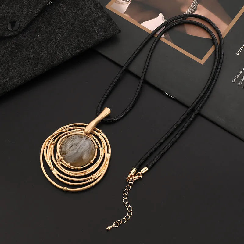 Women's vintage gold geometric pendant sweater chain necklace with adjustable length and snakeskin wax rope chain