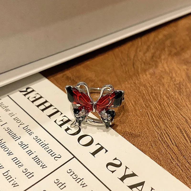 Copper women's ring featuring a creative Chinese butterfly design, available in multiple colours.