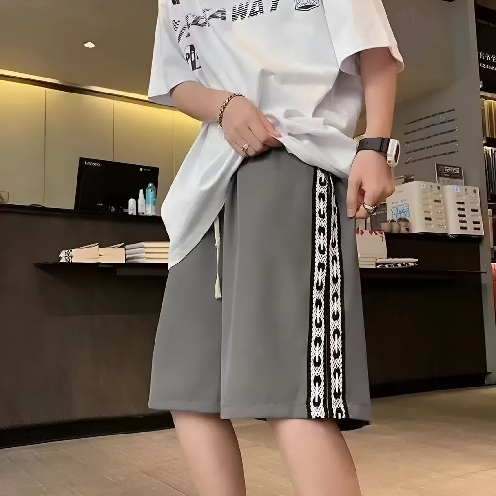 Men's casual baggy track pants in micro-elastic polyester available in sizes M to 5XL
