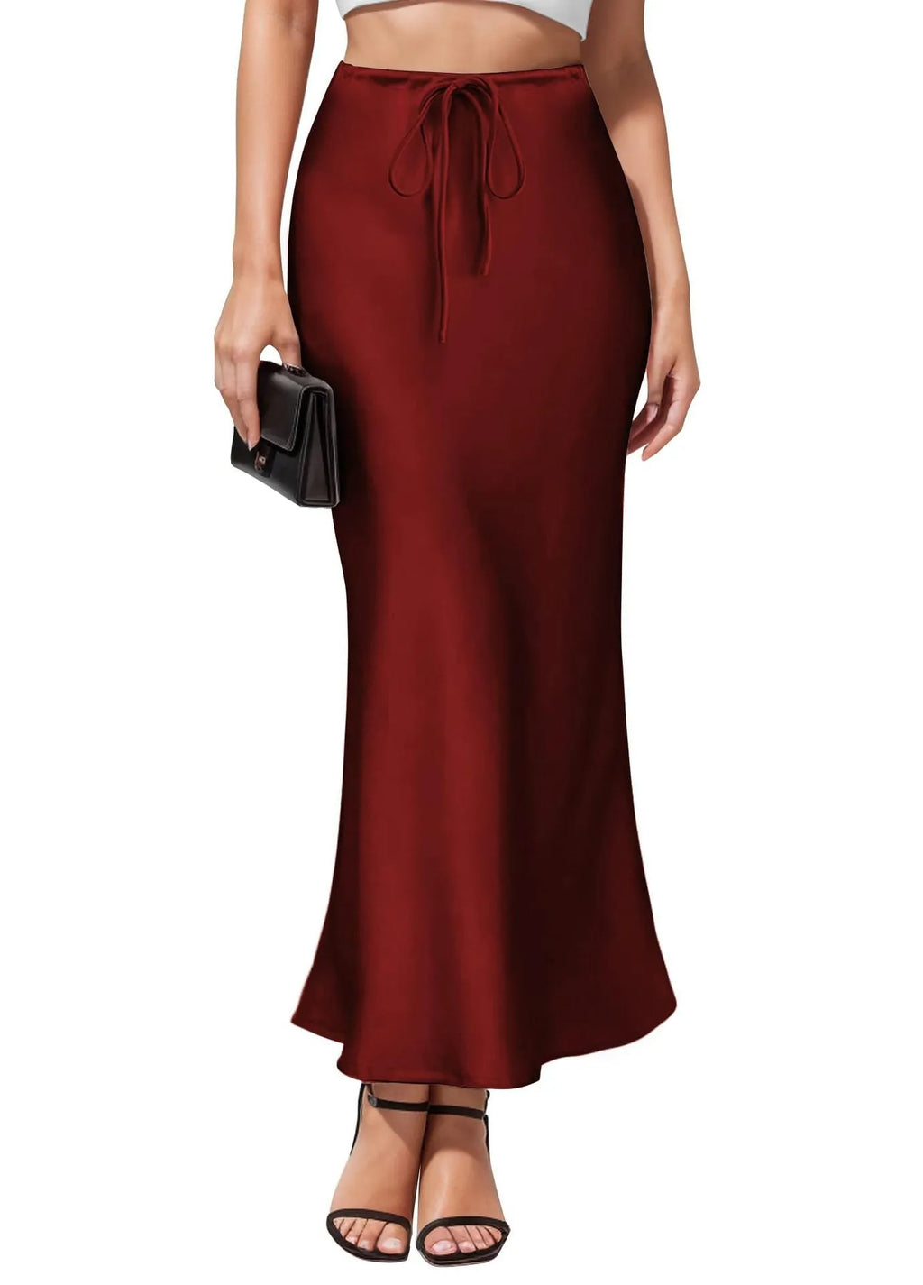 High-waisted asymmetric acetate skirt in a solid colour with irregular stitching detail on the hem.