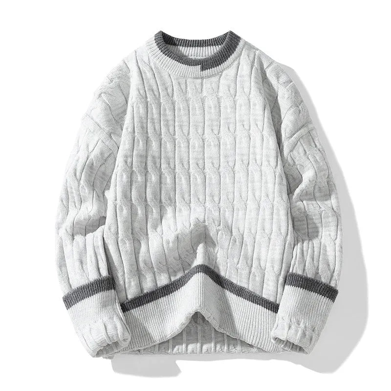 Man wearing a loose-fit long sleeve modal sweater in light blue, part of a two-piece set.