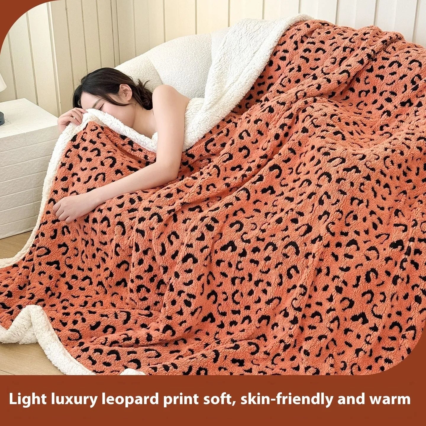 Double-layer Jacquard taffeta blanket with leopard print design in camel colour folded to show texture and pattern detail
