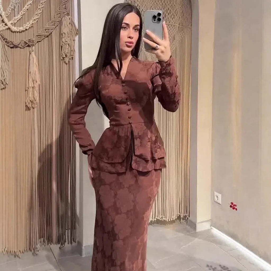 Dark brown artistic retro long sleeve pullover dress with plant pattern and button detail.