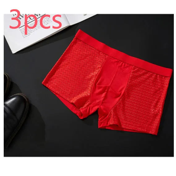 Men's solid colour ice silk modal boxer briefs with a U convex design on a mid waist.