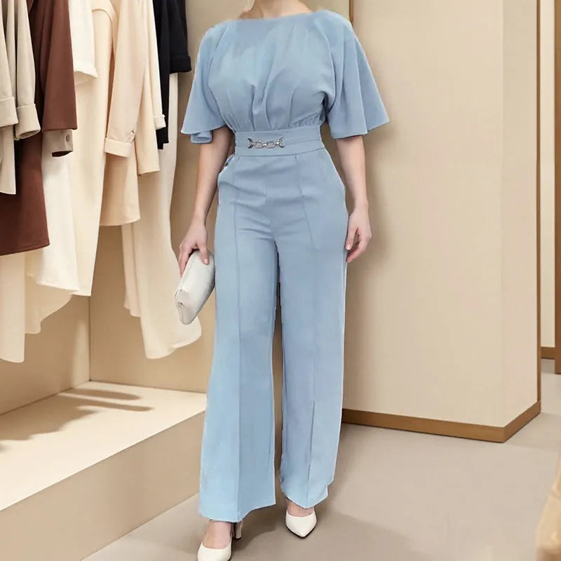 Blue men's two-piece suit with long sleeve jacket and trousers on a hanger